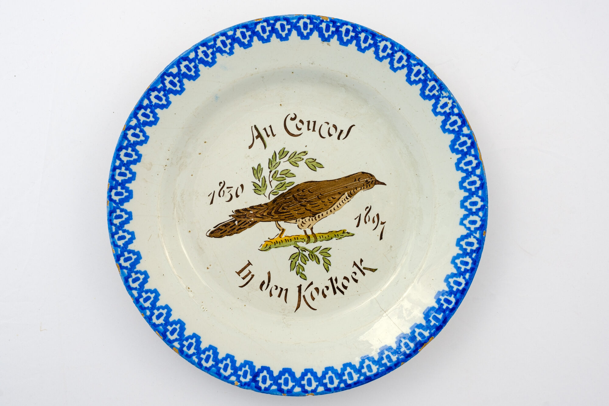 Bord 'Au coucou', faience, Brussel, 1897