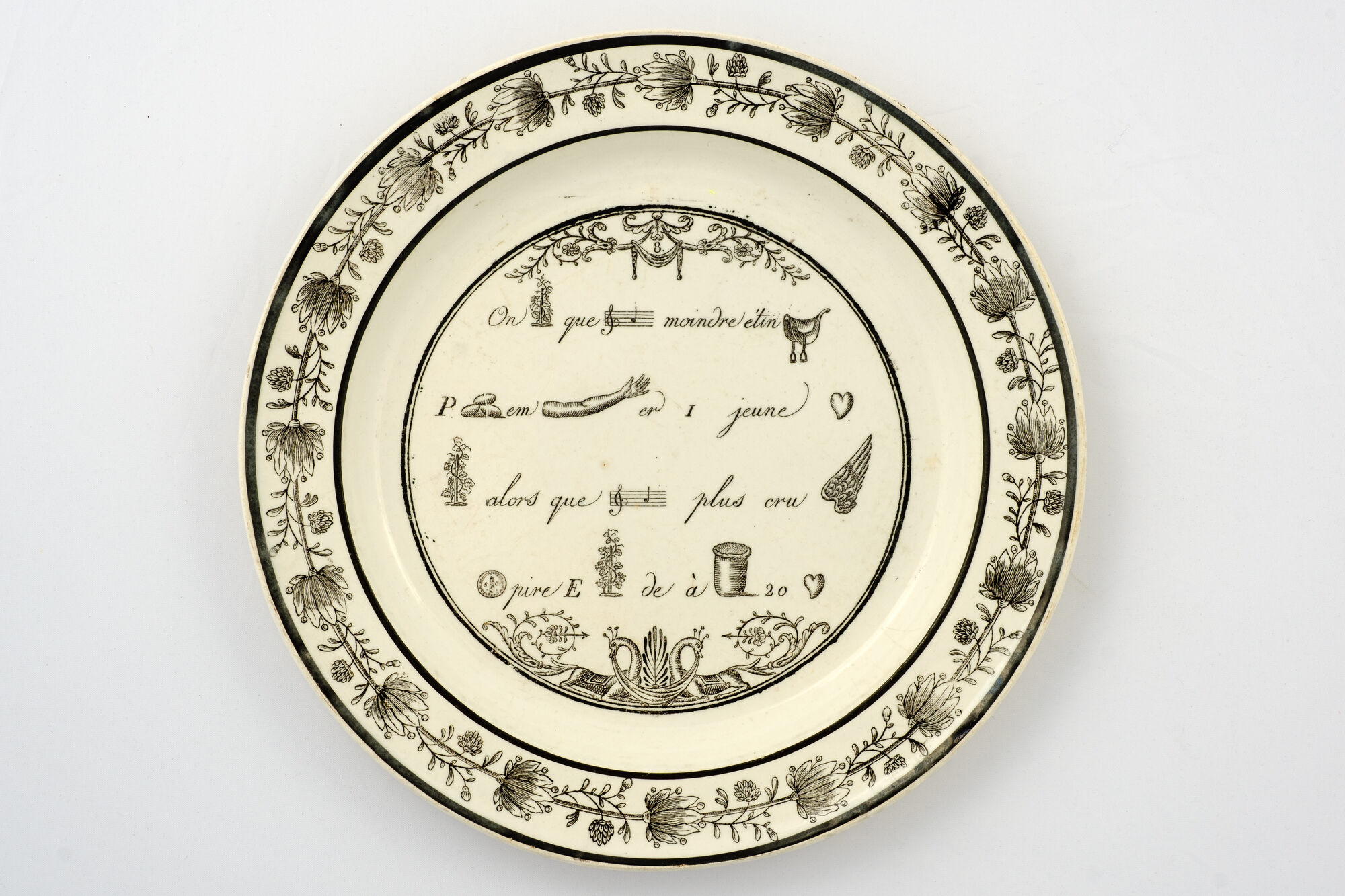 Bord in steengoed met rebus, Choisy (FR), 1824-1836