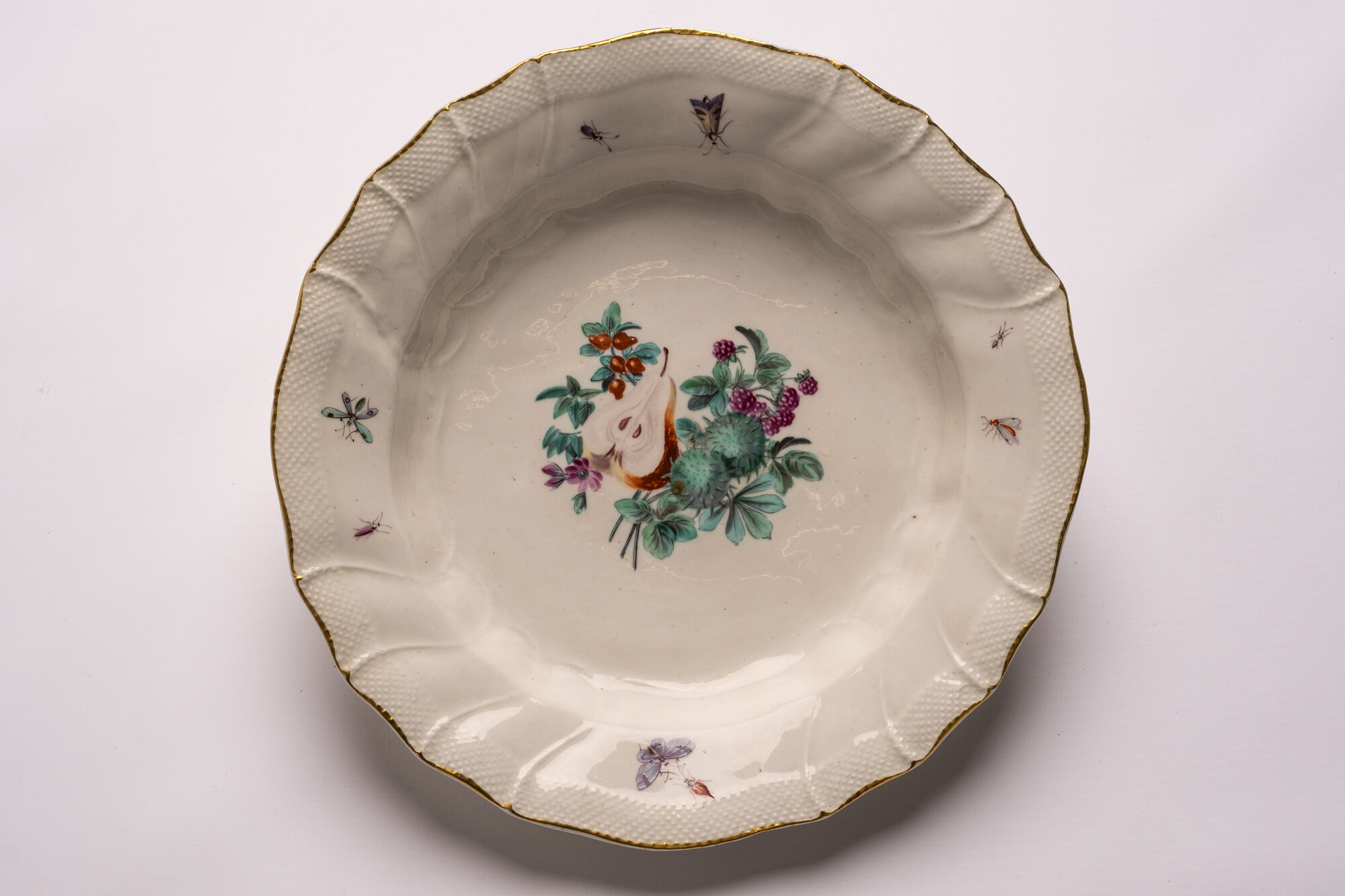 Diep bord, porselein "pâte tendre", Doornik
